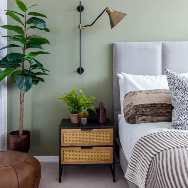 Stylish furnished bedroom with modern decor